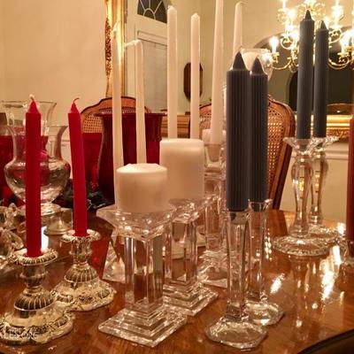 Candle collection with silver, glass and crystal holders -- including hurricanes, votives, and Crate and Barrel items. More than 300...