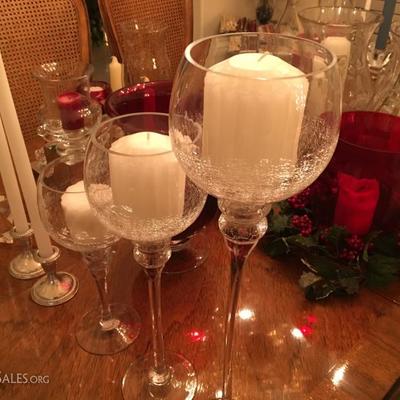Candle collection with silver, glass and crystal holders -- including hurricanes, votives, and Crate and Barrel items. More than 300...