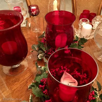Candle collection with silver, glass and crystal holders -- including hurricanes, votives, and Crate and Barrel items. More than 300...