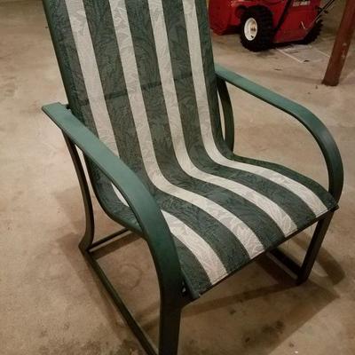 One of eight patio chairs