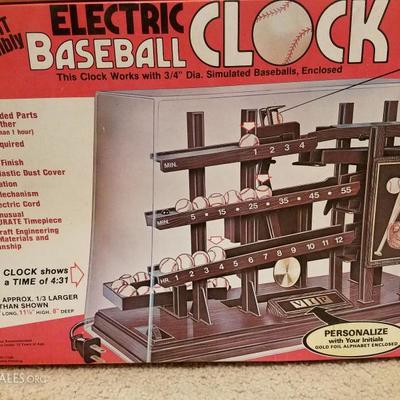 Arrow baseball-themed rolling ball clock