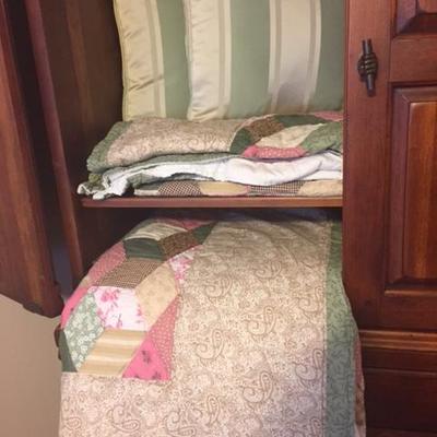Throw Pillows, Full Size Quilts in the Master Bedroom Armoire