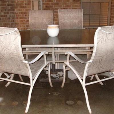 Aluminum Outdoor 7 pcs. Glass Top Dining Table with 6 Arm Chairs (2 Swivel & 7 Stationary)