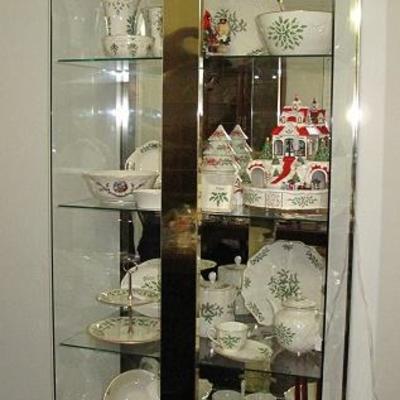 Brass and Glass Lighted Curio packed full of Lenox Holiday Porcelain Serving & Accessories