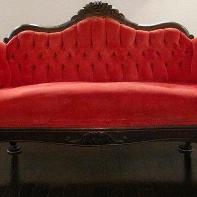 Antique Mahogany Serpentine Back Settee in a Tufted Back Red Velvet Upholstery 