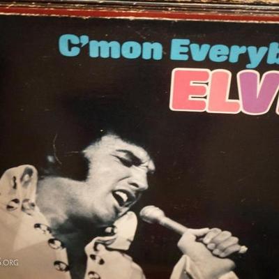 Elvis lot! Approximately 25 Elvis records. also includes 3 sheets of Elvis stamps, and Joseph Adair'