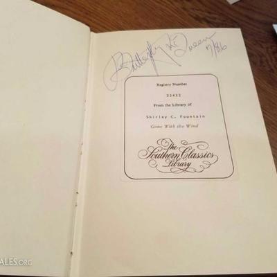 Gone with the wind book signed by Butterfly McQueen from the Southern Classics Library. Also include
