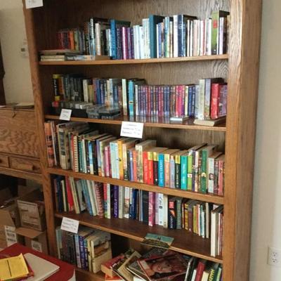 Tons of books and oak bookcase 