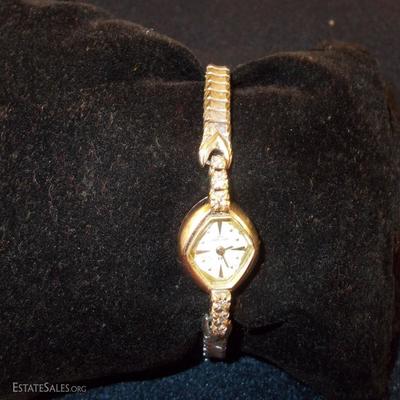 Vintage Lady Hamilton watch: The gold is 14K; there are 6 diamonds; the stem need a cap. $150 as.