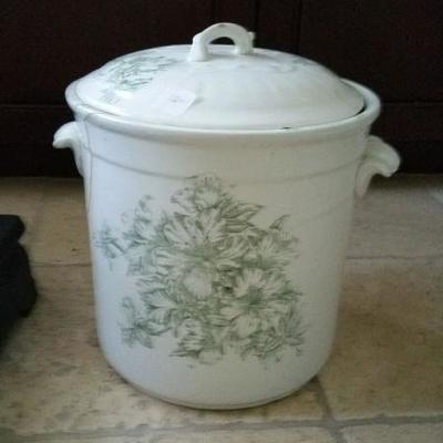chamber pot--several cracks but has held loose change for years without any problems.