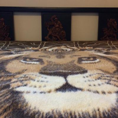 Carved Wood Headboard and Lion Throw