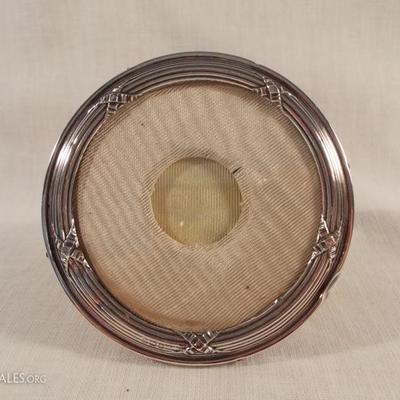 English Sterling Round Velvet. It measures 3 Â¼â€™ round. The backing is moirÃ©. 
$48