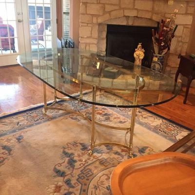Stylish glass brass oval table used in living room or dinning room (must see to appreciate)