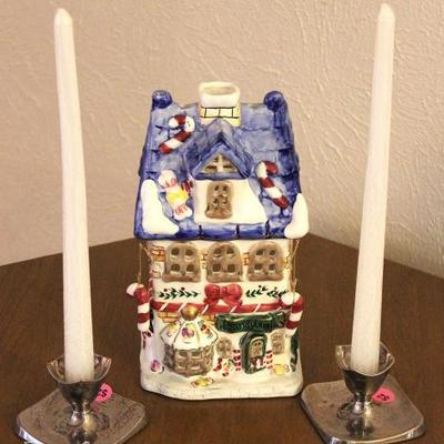 Pair of candle sticks with christmas jar
