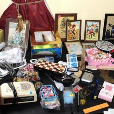 Box lot of miscellaneous items on table
