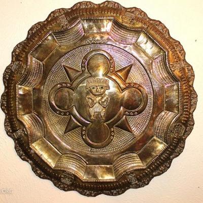 Brass Colombian wall hanging charger

