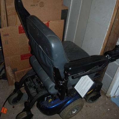 $50 MOTORIZED CHAIR, PROBABLY NEEDS NEW BATTERY, DOESN'T MOVE
