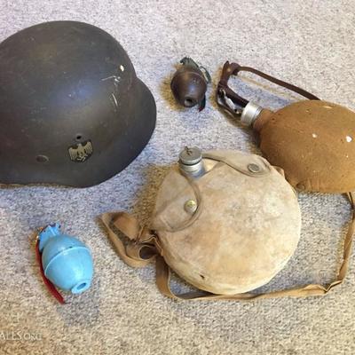 Military helmet, canteen and grenades