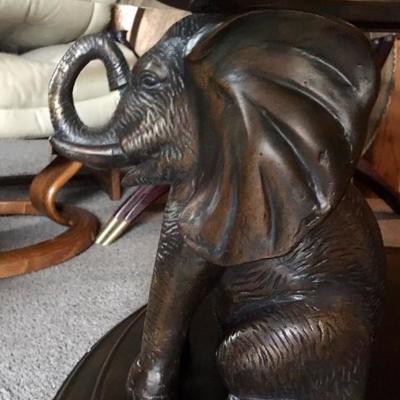 Wood carved safari figures with glass top coffee table