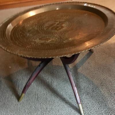 Tripod table with brass top