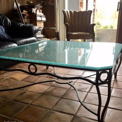 Etched glass coffee table with heavy metal base
