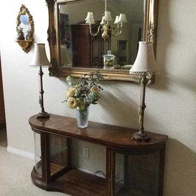 Dining room wall table and ornate mirror 
