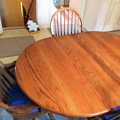 Oval wood table with 4 chairs