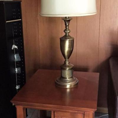 End table with brass lamp