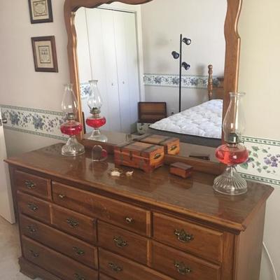 Queen bedroom set.  Includes headboard, dresser with mirror and nightstand. $350