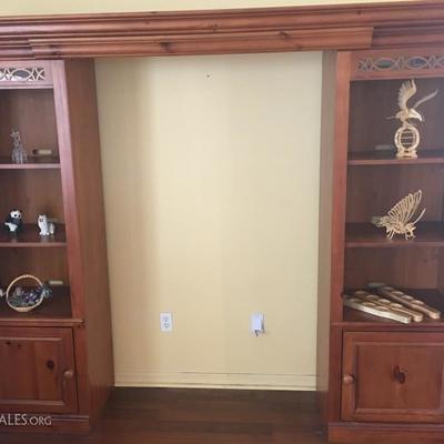 Entertainment Center $195.  Top is removable and could be used as 2 display cabinets.
