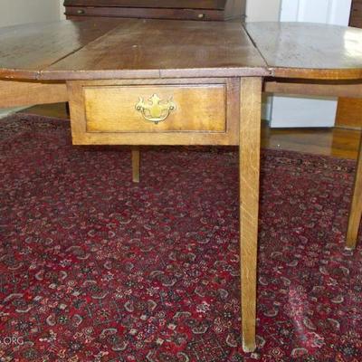 Oval top drop leaf dining table 54 X 28 1/2