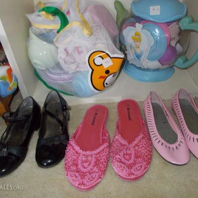 Even a little girl can never have too many pairs of shoes.
