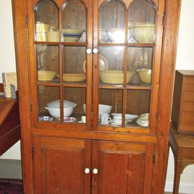 Pine Corner cupboard arched glass doors above paneled cabinet $475
72 X 43