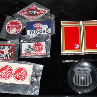 Railroad patches, playing cards, paper weight