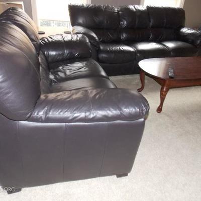 Black leather love seat that matches the black leather couch