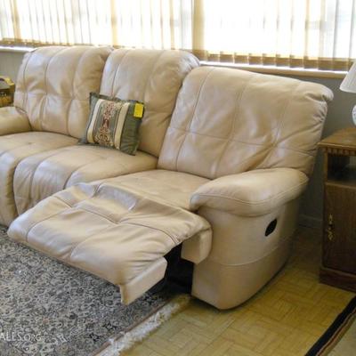 leather reclining sofa, rug, etc.