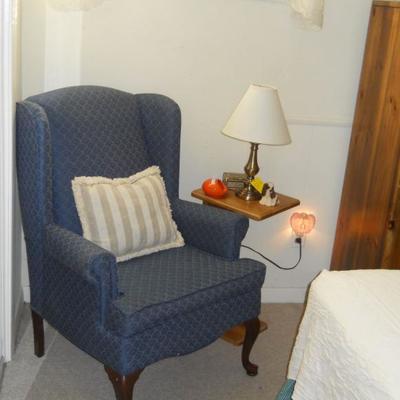 wingback chair, side table, lamp, etc.