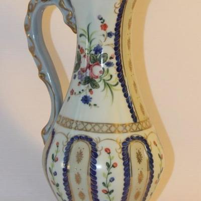 Decorative porcelain pitcher by Dominie's
