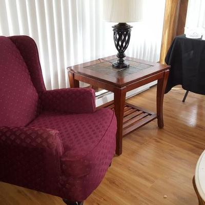 Wing back chair with tile topped accent table