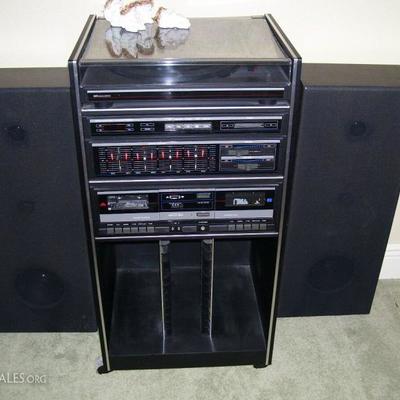 Vintage stereo with turntable, radio, and dual cassette - works great