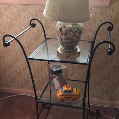 Wrought Iron side table and shell-filled lamp