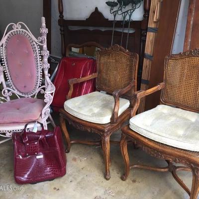 Vintage chairs and luggage