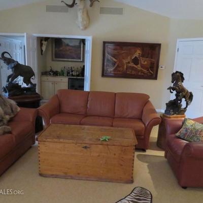 Family room with art & bronze statues