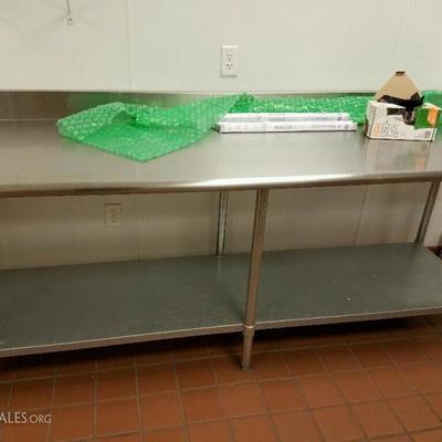 Stainless steel work table with backsplash and lower Shelf 8' across x 30