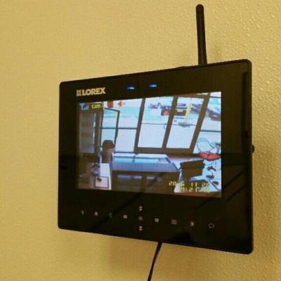 Lorex security system includes 4) cameras and base unit