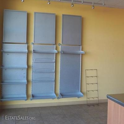 three sections of brushed nickel wall display Â 