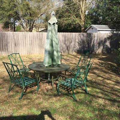 ROUND WROUGHT IRON PATIO TABLE WITH MATCHING CHAIRS