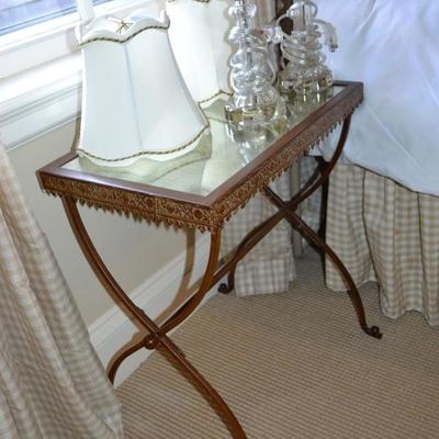 One of two mirror top bedside table