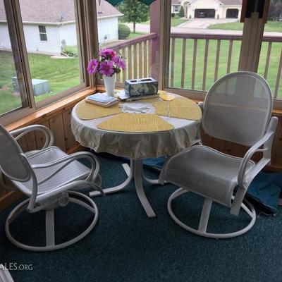 6 piece Patio Set includes wood-top table, 2 swivel/rocker chairs, side table, glass top table and 2-person glider  (see other photos for...