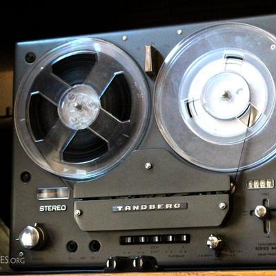 Tandberg 64X four track reel to reel tape player with manual, assortment of tapes